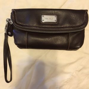 Brown leather wristlet with front pocket